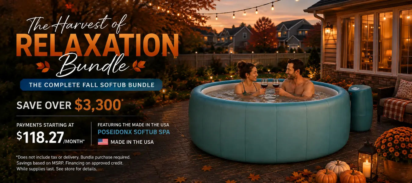 Couple relaxing with wine in a PoseidonX Softub spa on an autumn patio at sunset.